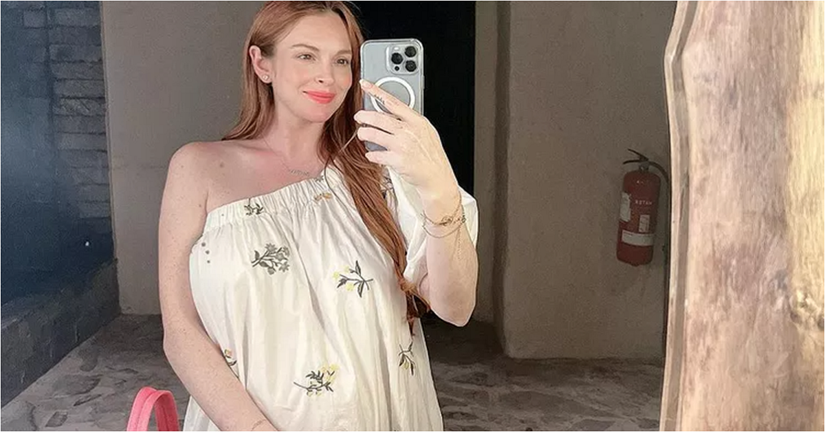 Pregnant Lindsay Lohan Glows in Mirror Selfie as She Shows Bump Under Flowy Dress: ‘Happy Monday!’